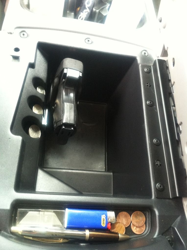 • 9MM Holster mount inside center console w/ pics